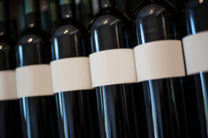 Wine with custom pressure-sensitive label